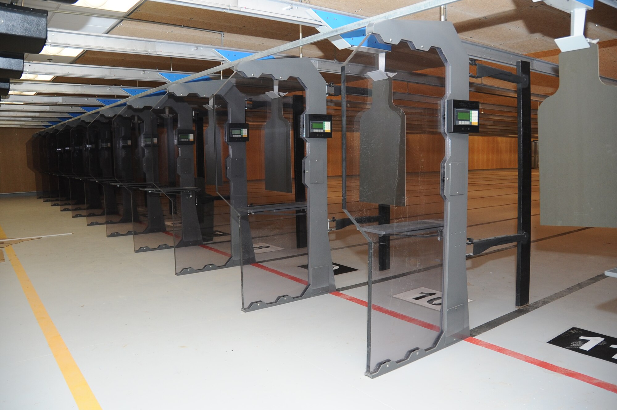 The Keesler Indoor Firing Range, located behind the  81st Security Forces Squadron, Keesler Air Force Base, Miss., is approximately 90 percent complete. The 81st SFS and other base personnel will use the facility for weapons training and qualifications. A retrieval system inside the firing range can be controlled by the range tower operator to set conditions such as illuminating targets for night time conditions or using strobe lights to give the effect of police cars at night.  (U.S. Air Force photo by Kemberly Groue)