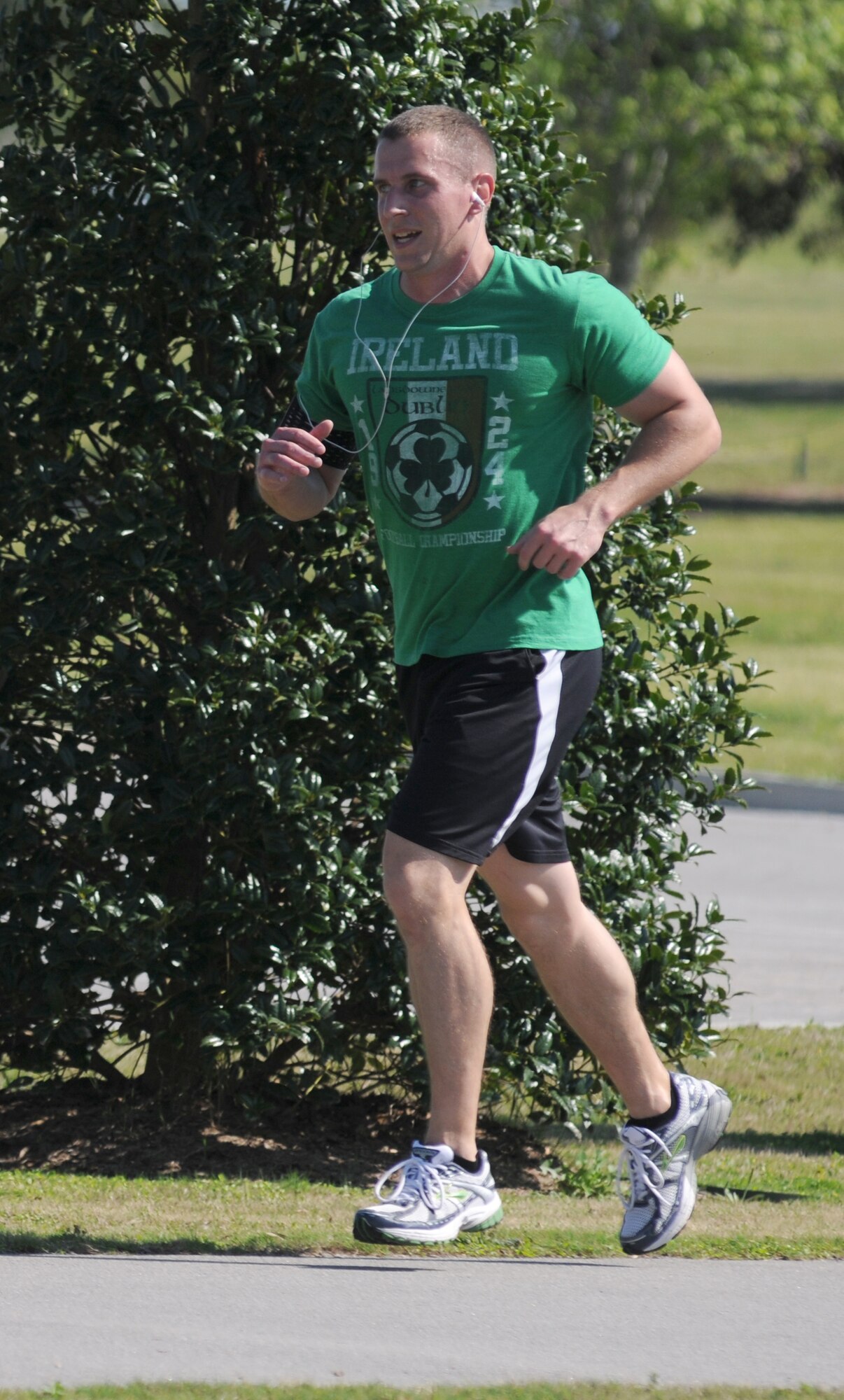 Capt. Jeff  Van Horn, 2nd Air Force, finished first place in 21:58 minutes in the male category during the 5K St. Patrick’s Day run/walk March 16, 2012, at the Bay Breeze Event Center, Keesler Air Force Base, Miss.  Prizes were awarded for first, second and third place in both the female and male category.  (U.S. Air Force photo by Kemberly Groue)
