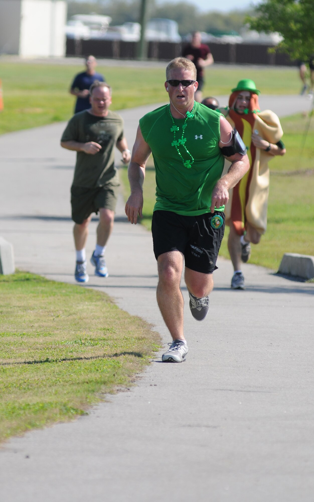 Staff Sgt. Brian Stryker, 334th Training Squadron, heads for the finish line during the 5K St. Patrick’s Day run/walk March 16, 2012, at the Bay Breeze Event Center, Keesler Air Force Base, Miss.  Prizes were awarded for first, second and third place in both the female and male category.  (U.S. Air Force photo by Kemberly Groue)