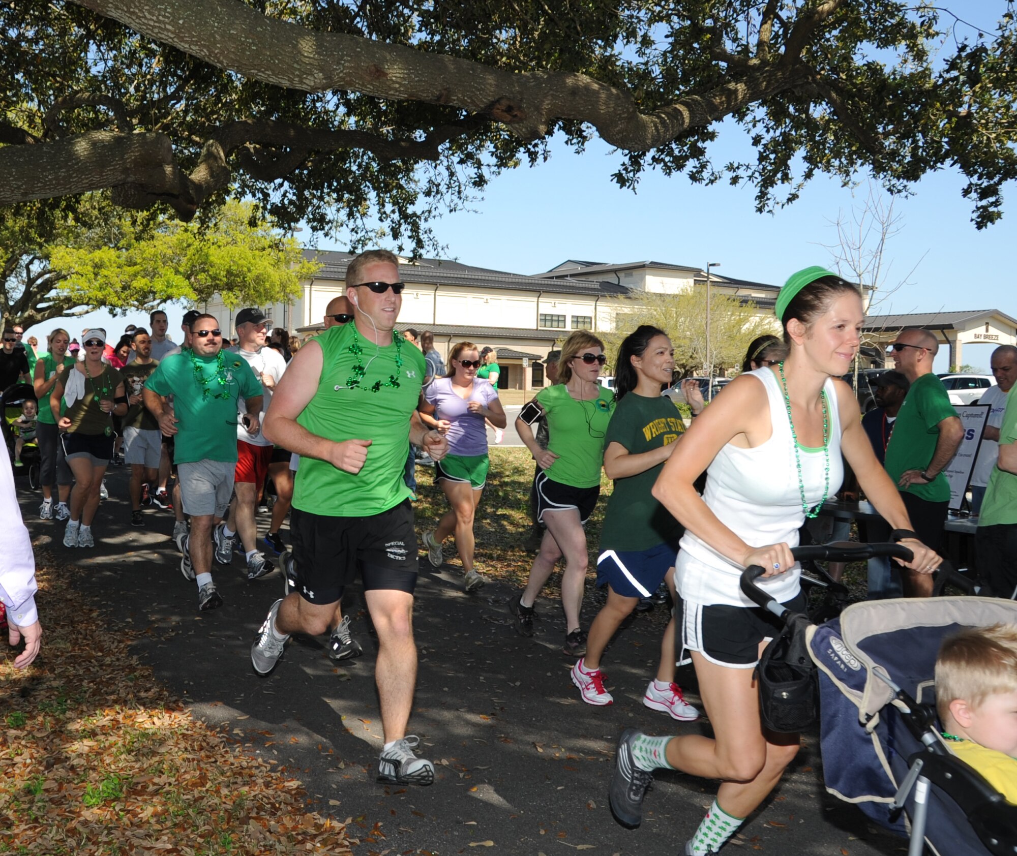 Runners begin the 5K St. Patrick’s Day run/walk March 16, 2012, at the Bay Breeze Event Center, Keesler Air Force Base, Miss.  Prizes were awarded for first, second and third place in both the female and male category.  (U.S. Air Force photo by Kemberly Groue)