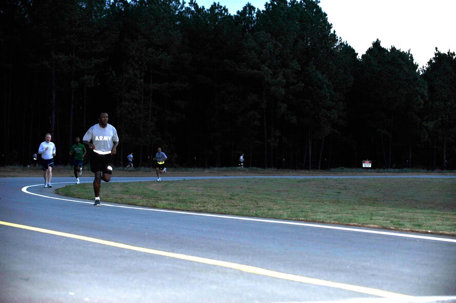 U.S. Air Force Airmen and U.S. Army Soldiers participate in  a 3.1 mile run outside the Fitness Center Annex  at Shaw Air Force Base, S.C., Mar. 16, 2012. This run was sponsored by the Fitness Center Annex in celebration of St. Patrick's Day. (U.S. Air Force photo by Airman Nicole Sikorski/Released)