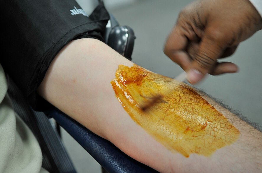 U.S. Air Force Senior Airman Christopher O'Brath, 20th Component Maintenance Squadron electronic warfare systems member, prepares to give blood at the Community Center at Shaw Air Force Base, S.C., Mar. 14, 2012. The blood drive is sponsored by the 20th Fighter Wing and  is held four times annually. (U.S. Air Force photo by Airman Nicole Sikorski/Released) 