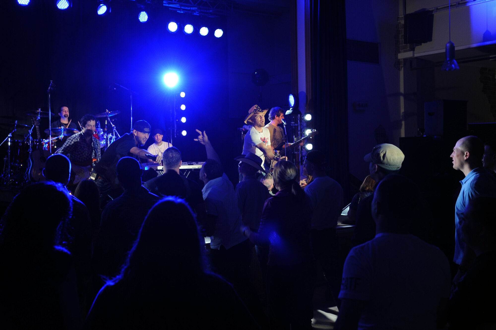 SPANGDAHLEM AIR BASE, Germany – The group LoCash Cowboys performs at the Brick House here March 18. The band played a variety of country and rock songs at six military installations in Germany to include Spangdahlem AB. The tour was sponsored by Stars for Stripes in partnership with Armed Forces Entertainment. Stars for Stripes is a non-profit organization designed to increase morale for overseas service members. (U.S. Air Force photo by Senior Airman Christopher Toon/Released)