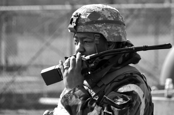 Tech. Sgt. Kevin Robinson, 51st Security Forces Squadron, calls in injury information to his leadership, following a simulated attack against Osan Air Base, March 20, 2012. Team Osan Airmen are participating in operational readiness exercise Beverly Midnight 12-01. (U.S. Air Force photo/Staff Sgt. Craig R. Cisek) 