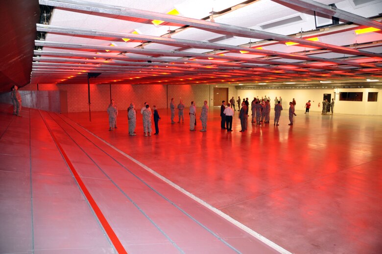 Officials toured the new indoor range facility at March Air Reserve Base. The U. S. Army Corps of Engineers Los Angeles District completed construction of the new indoor small-arms firing range. Rep. Ken Calvert, along with Corps, base and local community officials, celebrated the milestone during a ribbon cutting ceremony here March 10.