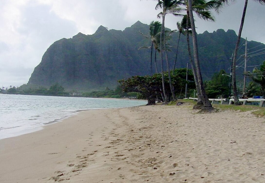 Kaaawa Shore Protection Project (looking toward Kaneohe) on the island of Oahu. In 1975, 9,300 cubic yards of sand were placed along the eroding shoreline to protect and maintain its natural appearance. 
