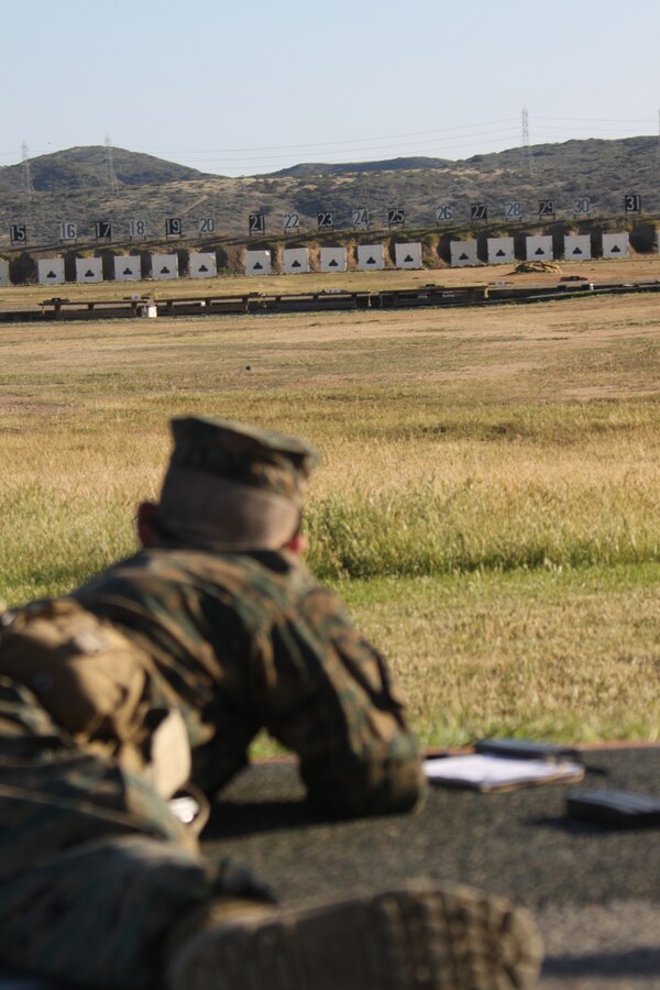 Recruit Cristos Diaz, Platoon 3254, Company L, 3rd Recruit Training Battalion, shoots in the prone from the 300-yard line March 20 on Delta Range, Edson Range, Weapons and Field Training Battalion, Marine Corps Base Camp Pendleton. Co. L started sending rounds down range in hopes to earn the title rifleman, one of the many training requirements to become a Marine while at Marine Corps Recruit Depot San Diego.
