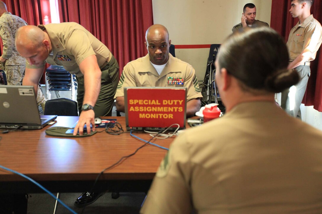 Gunnery Sgt. Derald Hampton, a representative with the Marine Security Guard Recruiting, Advertising and Screening Team, Marine Corps Embassy Security Group, interviews a Marine Security Guard applicant in Las Pulgas, March 20. The Marine Security Guard Program has been in place since December 1948 and provides protection for U.S. citizens and U.S. Consulate premises and or facilities.