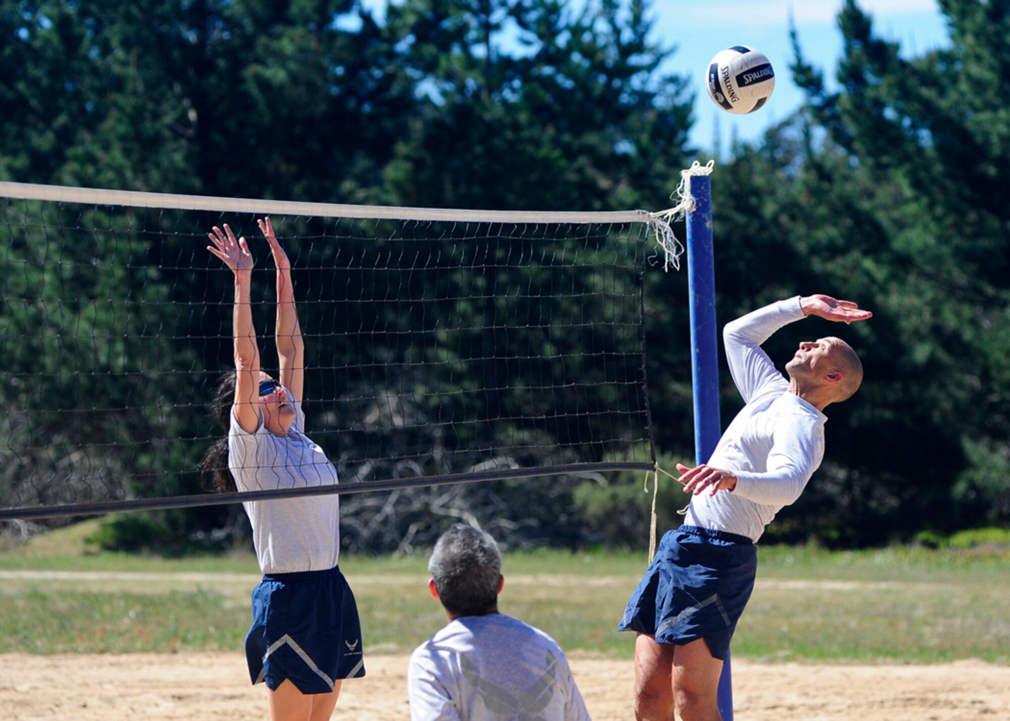 VANDENBERG AIR FORCE BASE, Calif. -- Airmen face-off during the "Eagles vs. Chiefs" volleyball game at the Air Force Assistance Fund kick-off barbeque here Tuesday, March 20, 2012. An "Eagles vs. Chiefs" game typically pits a team of Vandenberg commanders against a team of Vandenberg command chiefs. The Chiefs won both matches by a score of 15 to 11. (U.S. Air Force photo/Michael Peterson)