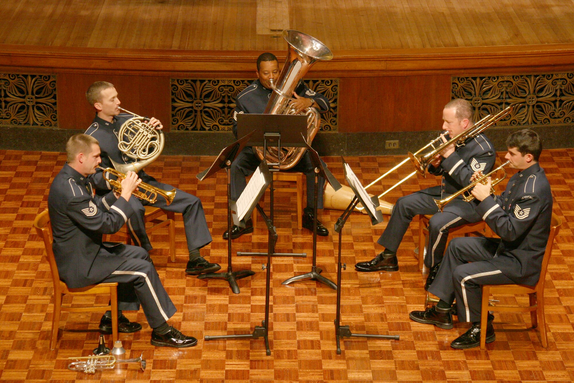 A brass quintet consisting of U.S. Air Force Band members performs.  On Apr. 13 at The Lyceum in Alexandria, Va., there will be an Evening of Music for Brass Quintet featuring a mix of classic and contemporary music.