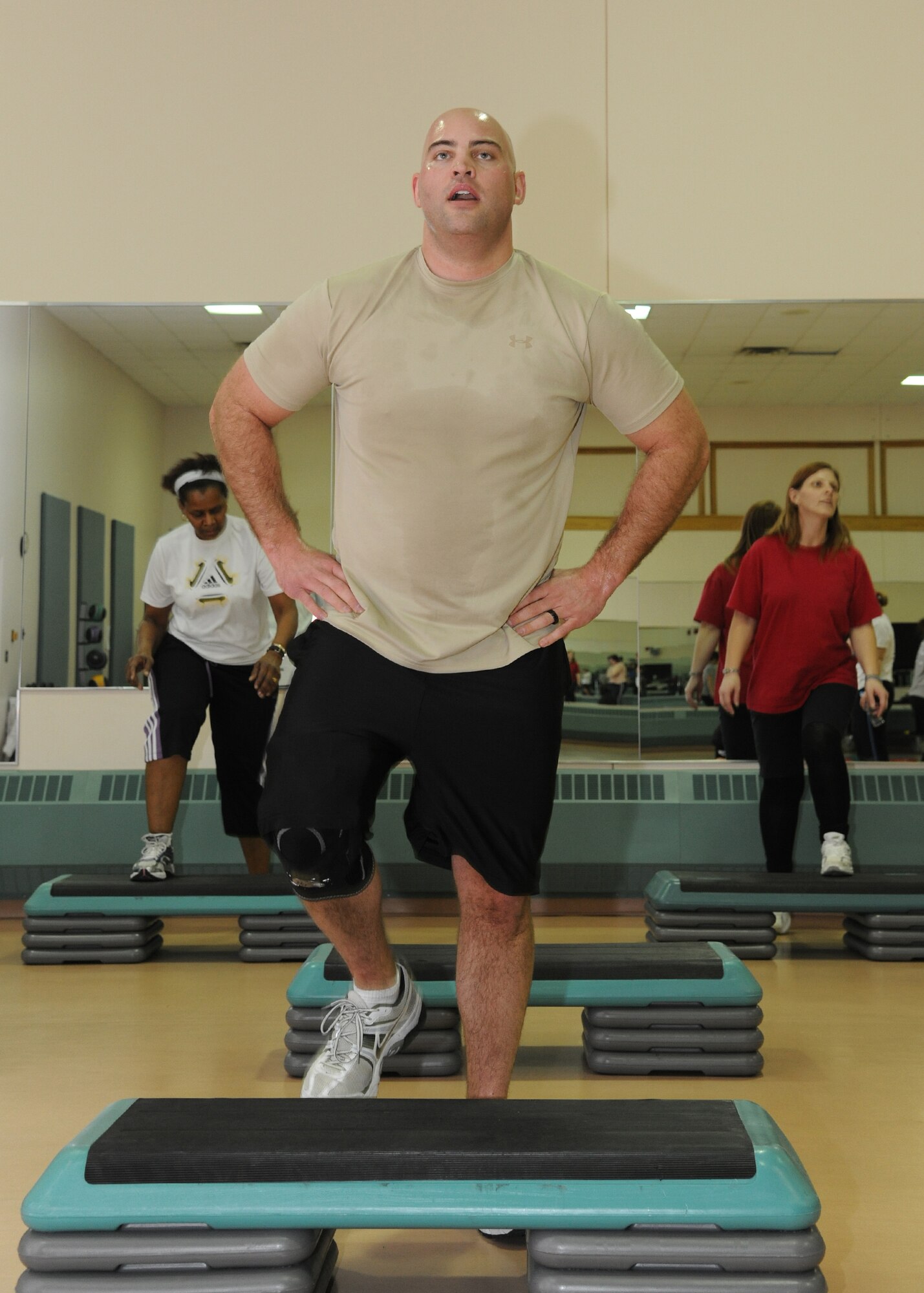 Tech. Sgt. Benjamin Hall, 319th Civil Engineer Squadron, aims to finish the last challenge of the Soar into Shape obstacle course March 8, 2012, on Grand Forks Air Force Base, N.D.  Soar into Shape is a nine-week challenge allowing participants to decide whether to lose or maintain weight, ultimately improving their overall physical health.  (U.S. Air Force photo/Airman 1st Class Ashley N. Taylor) 