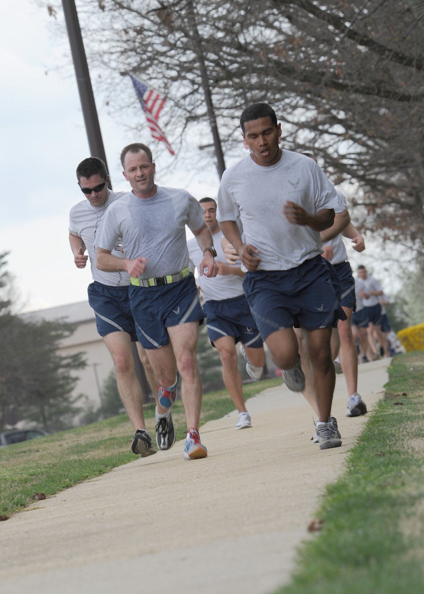 Col. Ken Rizer, 11th Wing commander, Joint Base Andrews, Md., participates in a base-wide fun run for the Air Force Assistance Fund kick-off on Andrews, Md., March 19. Various Units from Air Force District of Washington, 11th Wing, 79th Medical Wing and Joint Base Anacostia-Bolling, D.C., participated in the 2-mile run. (U.S. Air Force photo/ Staff Sergeant Matt Coleman-Foster)