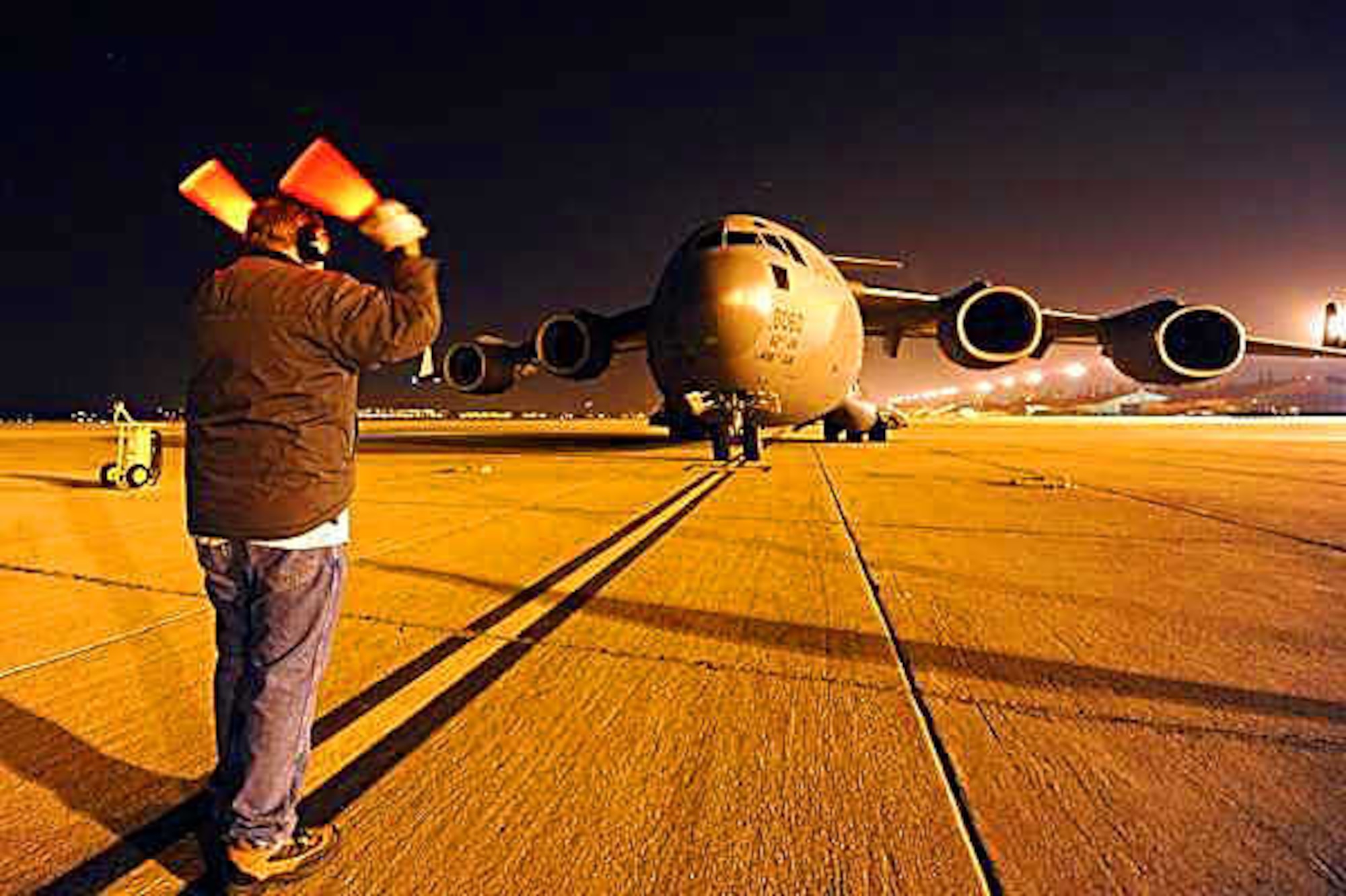 A C-17 Globemaster III from Joint Base Lewis-McChord, Wash., arrives at March Air Reserve Base, Calif., to pick up supplies bound for Japan in 2011. (U.S. Air Force photo/Senior Airman Matthew Smith)