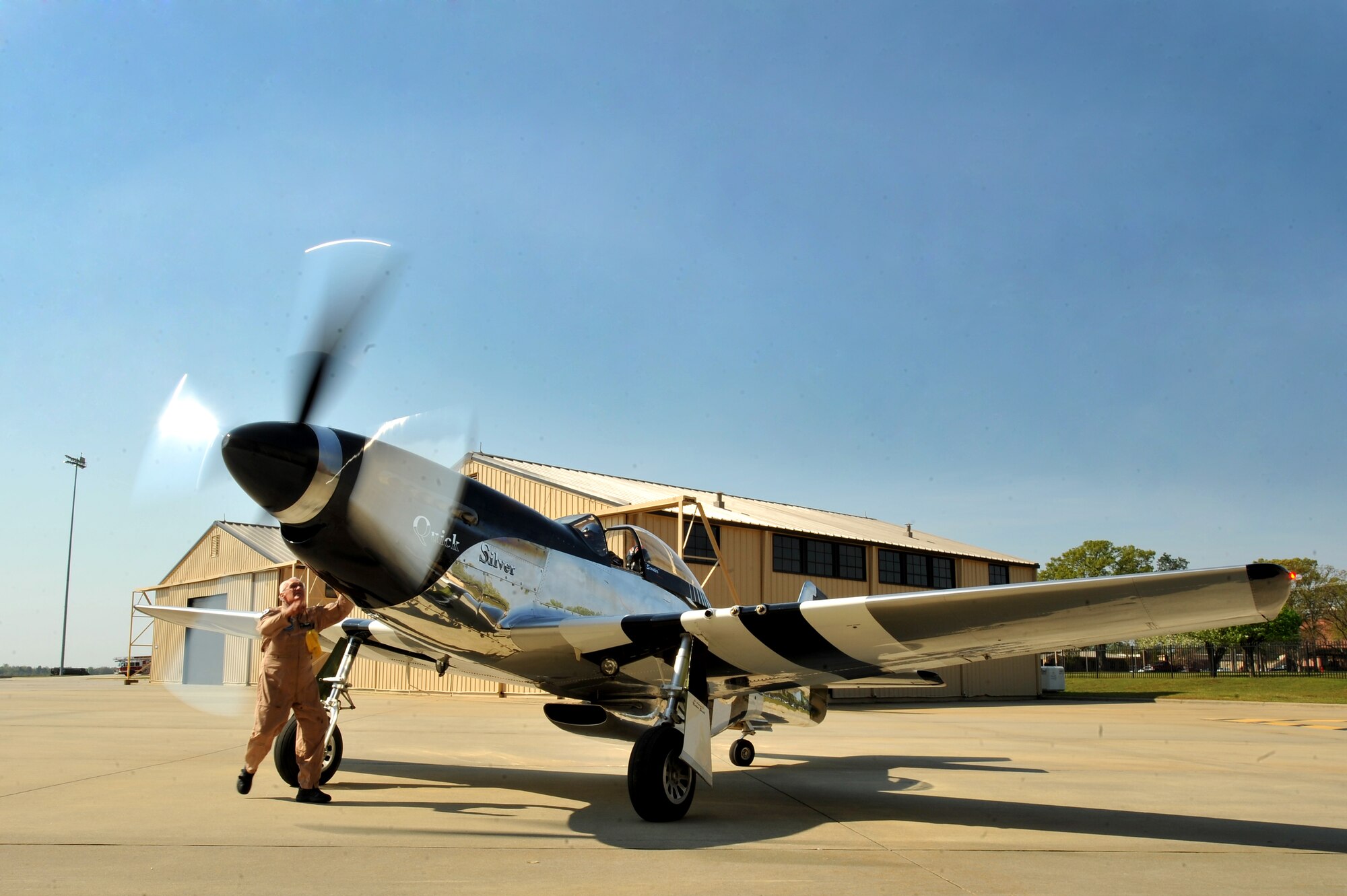 Mr. Bill Yoak, P-51 Mustang owner and crew chief, performs preflight checks prior to takeoff, Shaw Air Force Base, S.C., March 19, 2012. The P-51 Mustang "Quick Silver" was restored more than 13 years ago by father and son Bill and Scott Yoak. Yoak's P-51 Mustang will be one of the many aircraft that will perform during the upcoming Shaw Air Expo, May 5-6. (U.S. Air Force photo by Senior Airman Kenny Holston/Released)


