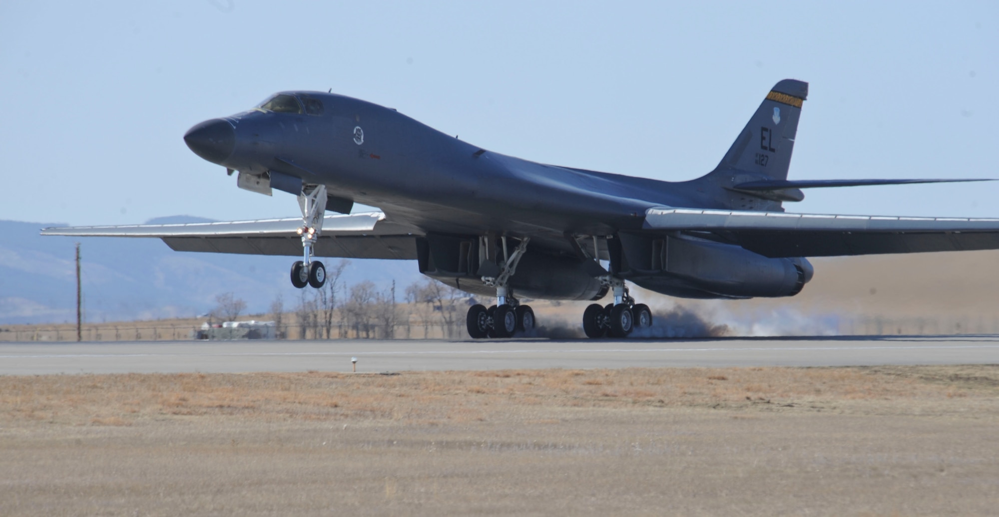 A B-1 bomber touches down during an Operational Readiness Exercise at Ellsworth Air Force Base, S.D., March 15, 2012.  OREs test the unit’s ability to quickly and efficiently mobilize Airmen, equipment and aircraft.  (U.S. Air Force photo by Airman 1st Class Anania Tekurio/Released)