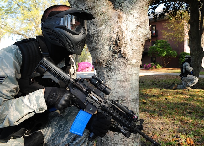 Senior Airman Matthew Baxter secures a building at Joint Base Charleston - Air Base after a simulated attack March 20.  During the active shooter scenario, the Anti-Terrorism/Force Protection exercise evaluated JB Charleston's capabilities in responding to a crisis situation.  Baxter is a 628th SFS journeyman. (U.S. Air Force photo/Staff Sgt. Katie Gieratz) 