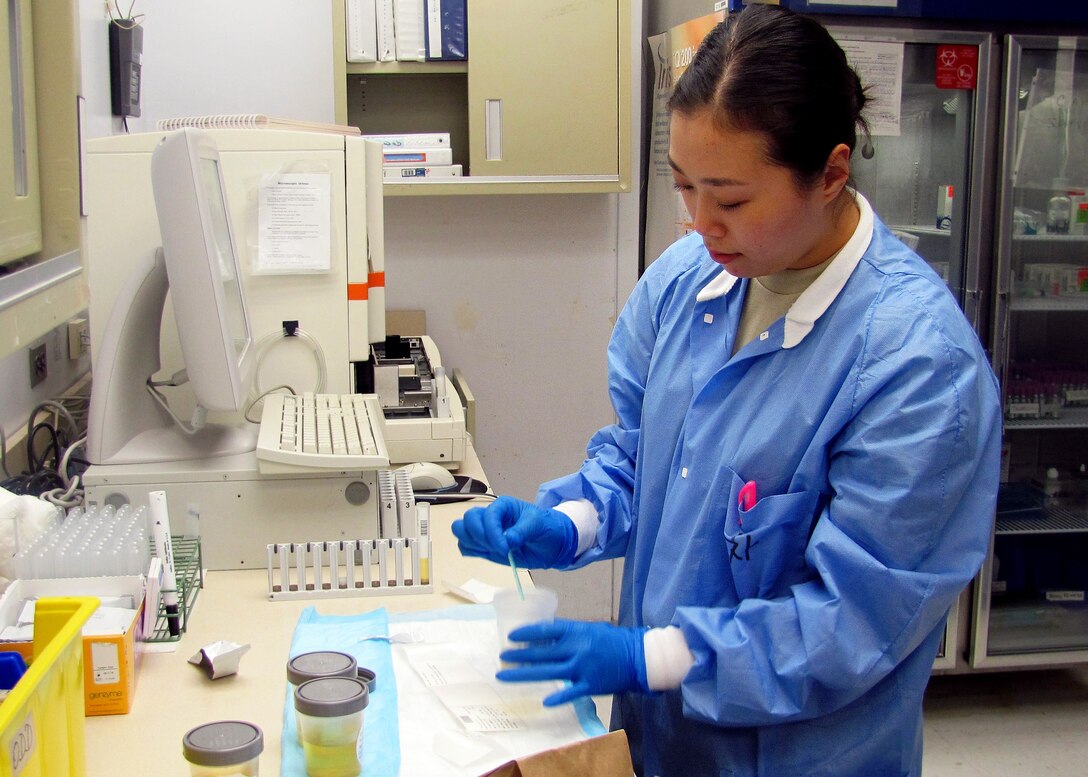 U.S. Army Spec. Hyo Jung Cha prepares a sample for analysis at the McDonald Army Health Center at Fort Eustis, Va.  Mar. 20, 2012. Cha was unclear of what she wanted to do with her life, she knew she wanted a career over a string of part-time jobs.  She joined the Army with her best friend, but the two were separated due to Cha's citizenship status.  She was not a U.S. citizen at the time and could not be stationed with her friend who chose the intelligence field.  With hopes of being stationed with her friend whom she's known since the fourth grade at Seoul International School, Cha plans to reclassify as a crypto logic linguist.  She said the Army has taught her the importance of education, and she now aspires to serve the Army as a warrant officer.  (U.S. Army photo by Marlon J. Martin/Released)
