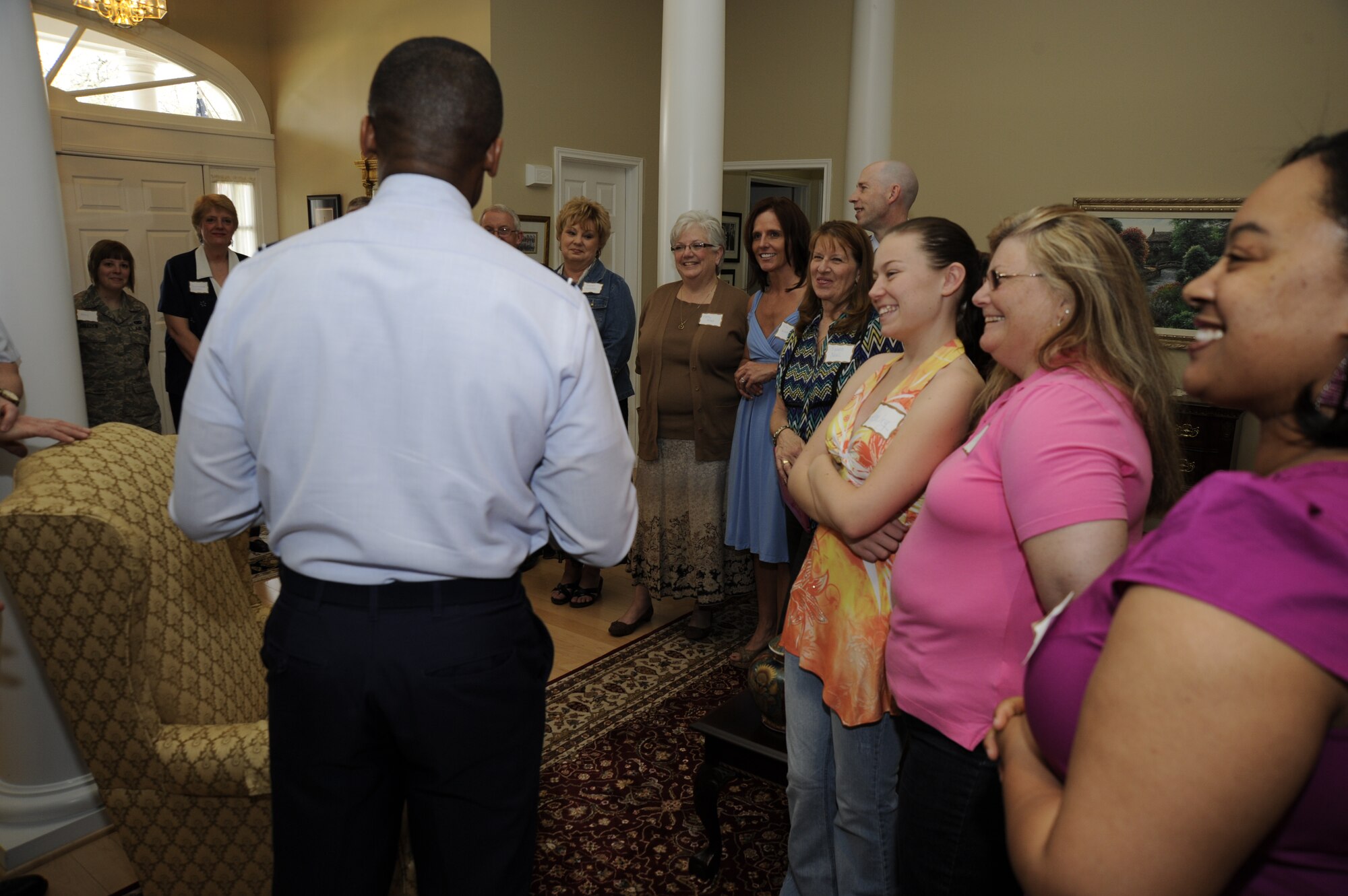 Air Force District of Washington Commander, Maj. Gen. Darren W. McDew thanks the volunteers of the Fisher House on Joint Base Andrews, Md., March 15. The Fisher House program is a unique private-public partnership that supports America's military through a program that enables family members to be close to a loved one during hospitalization or treatment for illness, disease or injury. (U.S. Air force photo by Staff Sgt. Christopher Ruano)