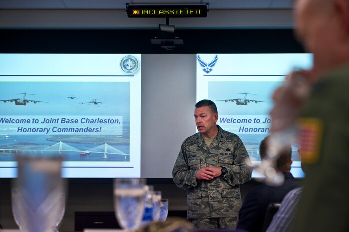 Col. Richard McComb briefs newly inducted Honorary Commanders on 628th Air Base Wing and JB Charleston operations March 14. More than 30 local area business and community leaders became Honorary Commanders of various Air Force, Navy and Army units at JB Charleston. McComb is the JB Charleston commander. (U.S. Air Force photo by Airman 1st Class George Goslin)