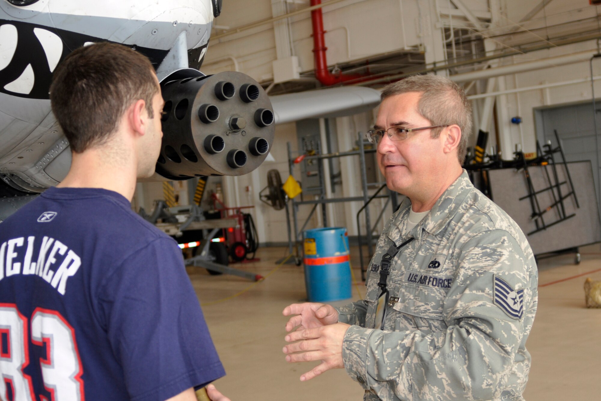 Tech. Sgt. Joseph Welebob, an aircraft electrician assigned to the 917th Aircraft Maintenance Squadron, explains the capabilities of the A-10 Thunderbolt II to Ian Oxender, a U.S. Air Force Civilian Career Trainee from Wright Patterson Air Force Base, Ohio, during his visit to Barksdale Air Force Base, La., March 15, 2012. Oxender is part of the Palace Acquire program, which is the Air Force’s civilian career development program that encompasses 2-3 years of entry level training including both: on-the-job training and formal training courses. (U.S. Air force photo by Betty Stephens/Released)