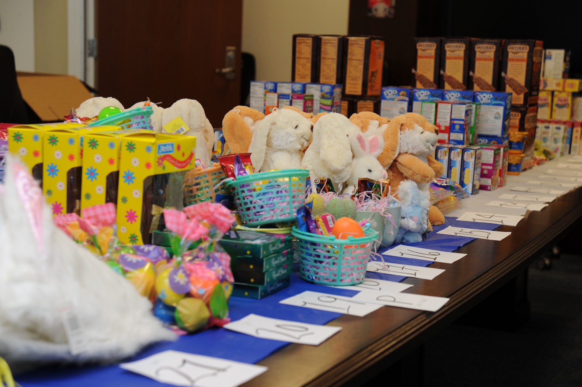 Easter treats are ready to be packed in boxes for deployed Air Force District of Washington service members March 1 on Joint Base Andrews, Md. For more information about the care package program, including what items are needed for the next round of packages, how to volunteer or support, contact the AFDW UDM at annette.bonaro@afncr.af.mil or 240-612-4486. (U.S. Air Force photo by Staff Sgt. Christopher Ruano)