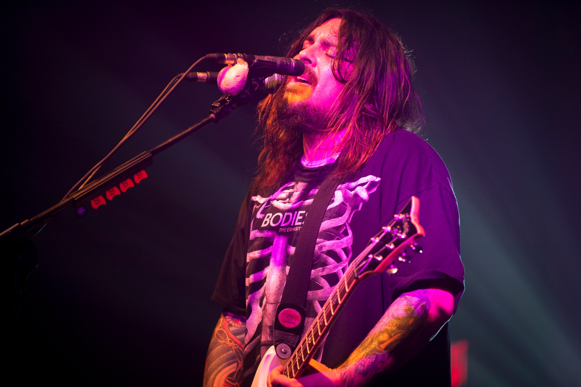Shaun Morgan, lead singer for the band Seether, performs for Team Incirlik March 19, 2012, at the Club Complex at Incirlik Air Base, Turkey. The hard-rock band visited Incirlik as part of a USO tour through Italy and Turkey. (U.S. Air Force photo by Tech. Sgt. Michael B. Keller/Released)