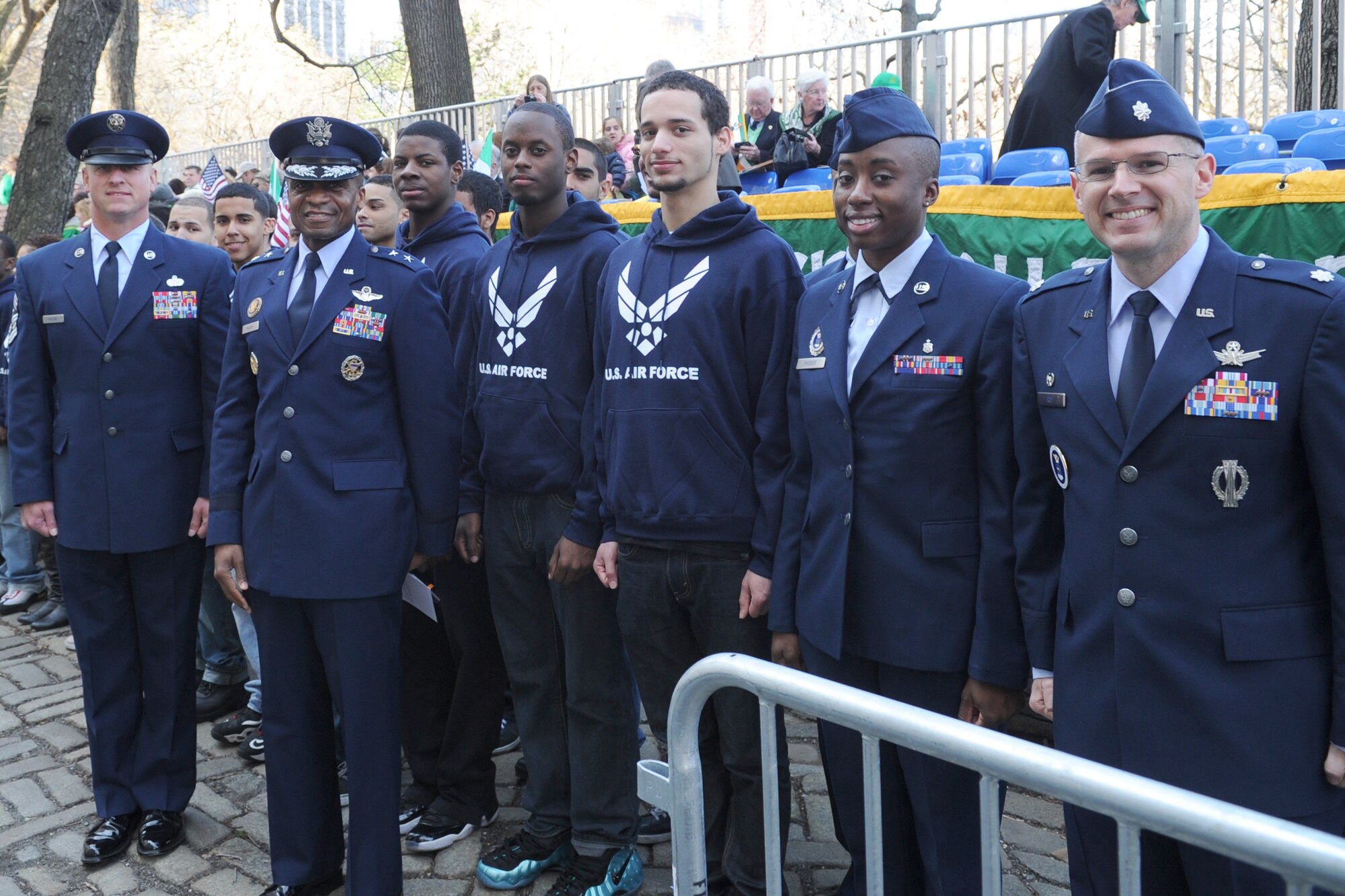 Air Force District of Washington Commander Maj. Gen. Darren W. McDew and Command Chief Master Sgt. Scott Fuller stand with the newest recruits to the U.S. Air Force March 17 in New York City, N.Y. McDew enlisted the 21 new recruit’s to the force minutes before the 251st annual St. Patrick’s Day Parade. (U.S. Air Force photo by Tech. Sgt. Raymond Mills) 
