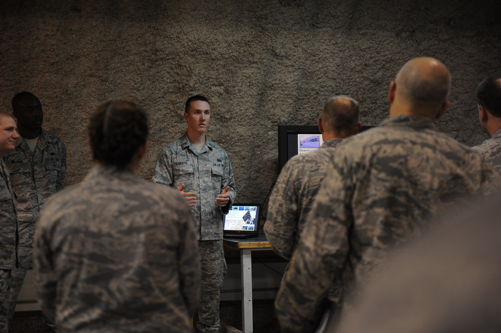 SOUTHWEST ASIA – First Lt. Andrew Roberts briefs Gen. Donald Hoffman, Air Force Material Command commander, on engineering successes in the past year on aircraft throughout the AOR March 16. (U.S. Air Force photo/Staff Sgt. Nathanael Callon)