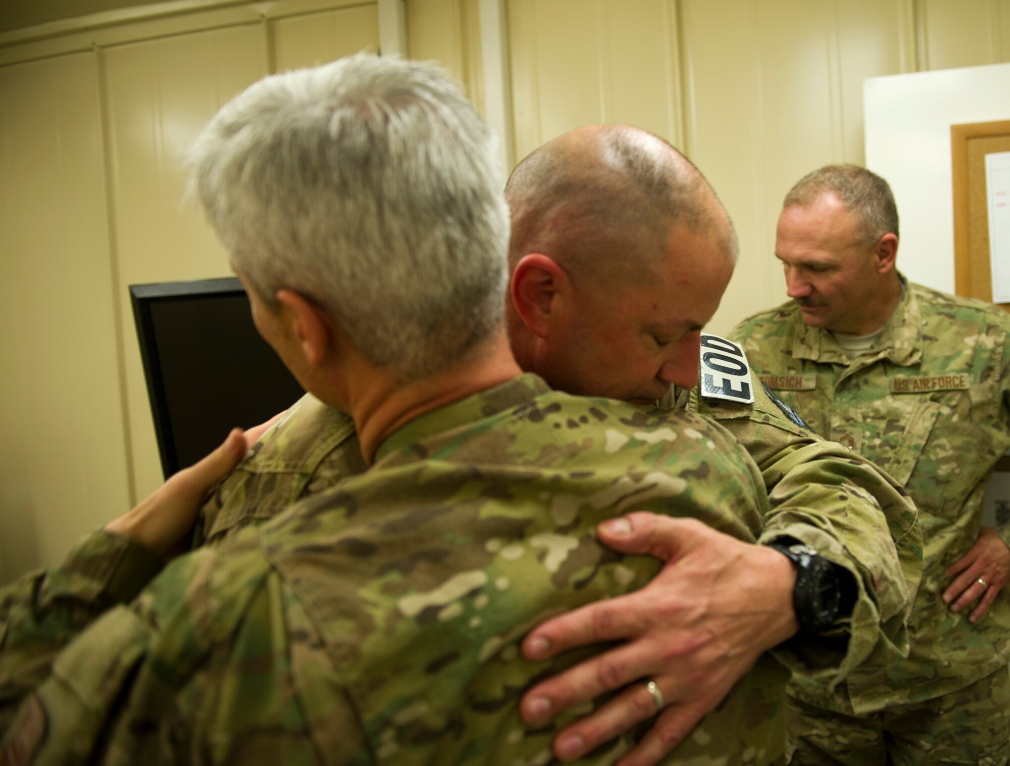 Senior Master Sgt. Chris Schott, Explosive Ordnance Disposal, hugs Chief Master Sgt. Robert Sealey, U.S. Air Forces Central command chief at Camp Bashton, Afghanistan, March 16, 2012. Earlier in the year, Sealey visited Schott and his team when they lost three of their Airmen to an explosion. The respect between both men can be seen on Schott's face here. (U.S. Air Force photo by Staff Sgt. David Salanitri) 

