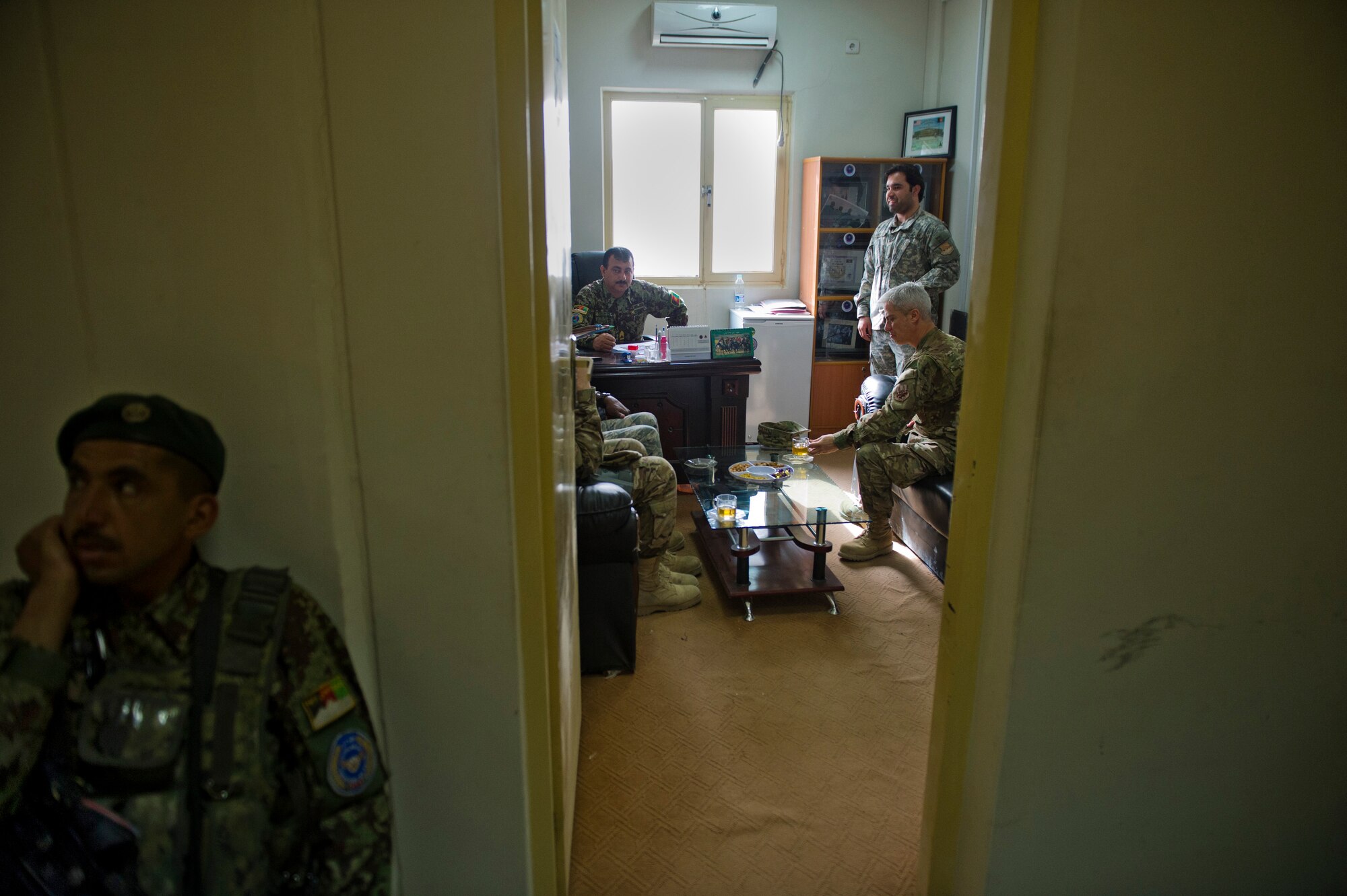 Center room, Chief Master Sgt. Robert Sealey, U.S. Air Forces Central command chief, engages in discussion with project leaders from the Air Expeditionary Advisory Training Mission - Afghanistan, March 15, 2012 at Kandahar Airfield, Afghanistan. (U.S. Air Force photo by Staff Sgt. David Salanitri)

