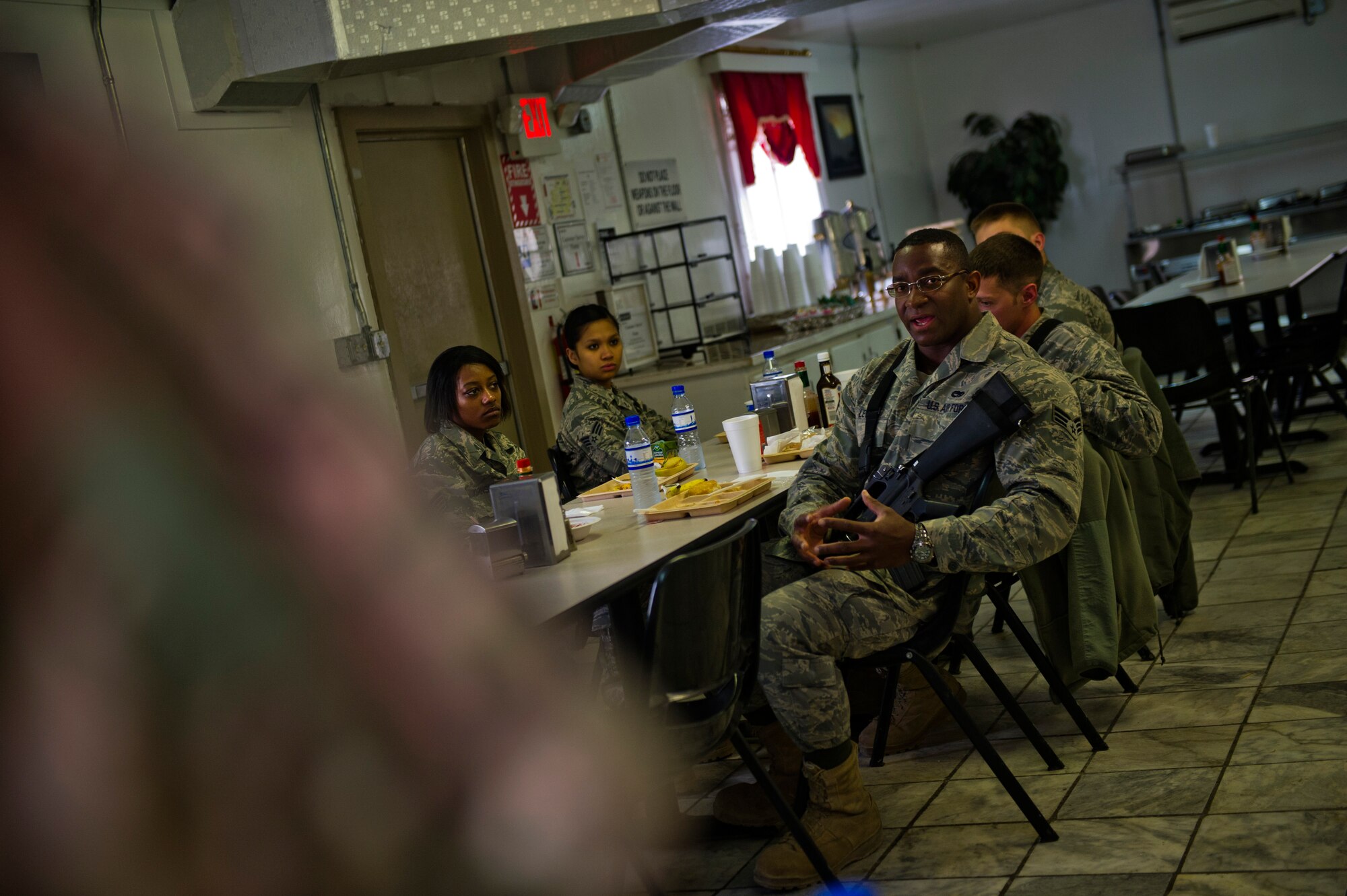 Senior Airmen Tariq Lewis, 455th Expeditionary Aircraft Maintance Squadron, asks Chief Master Sgt. Robert Sealey, U.S. Air Forces Central command chief, a question about the future of the A-10 Thunderbolt II, March 14, 2012 at Bagram Airfield, Afghanistan. During each visit, Sealey opens the floor up for questions, comments and concerns. (U.S. Air Force photo by Staff Sgt. David Salanitri) 

