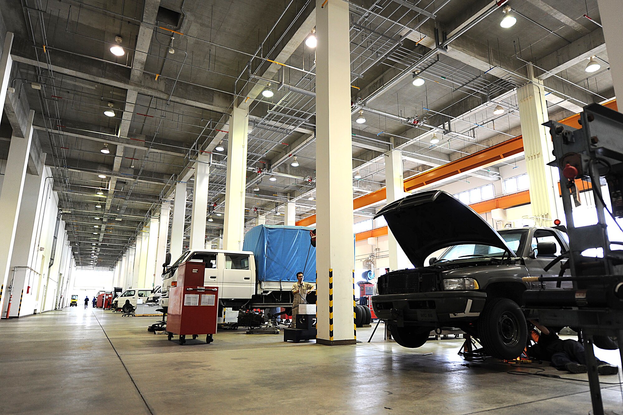 U.S. Air Force Senior Airman Craig Galvin, 18th Logistics Readiness Squadron vehicle maintenance journeyman, works on fixing a truck on Kadena Air Base, Japan, March 20, 2012. Galvin and the other Airmen of vehicle maintenance help keep  Shogun Airmen mobile so the Kadena mission can be completed more efficiently. (U.S. Air Force photo by Airman 1st Class Brooke P. Beers/Released)