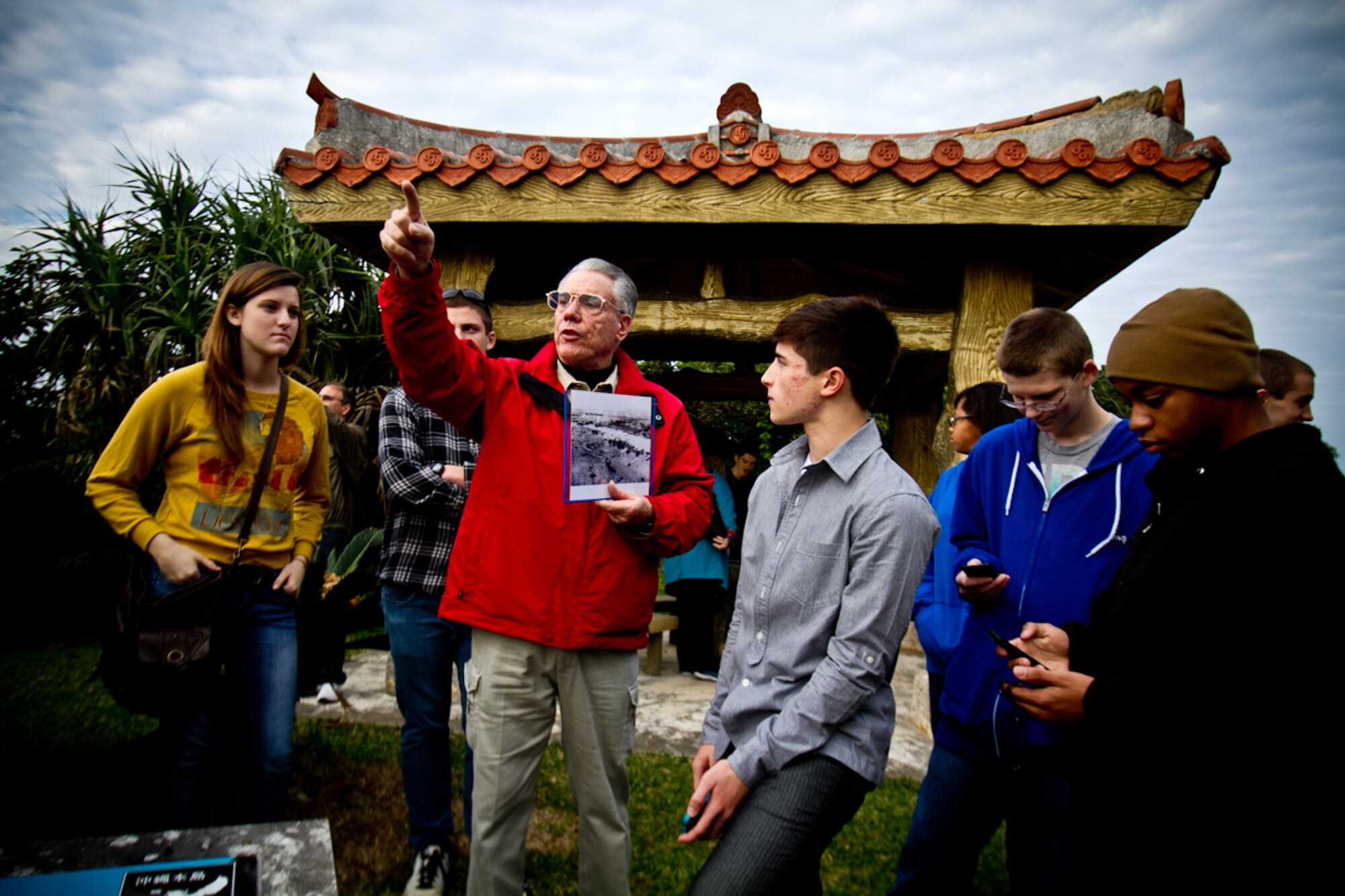 (Ret.) Senior Master Sgt.David Weissgerber points out areas of significance as he takes cadets around Okinawa for a tour of the island and battle sites.  Weissgerber has served the Air Force since 1962, as both active duty and a JROTC instructor.  
(U.S. Air Force courtesy photo by Kadena High School)