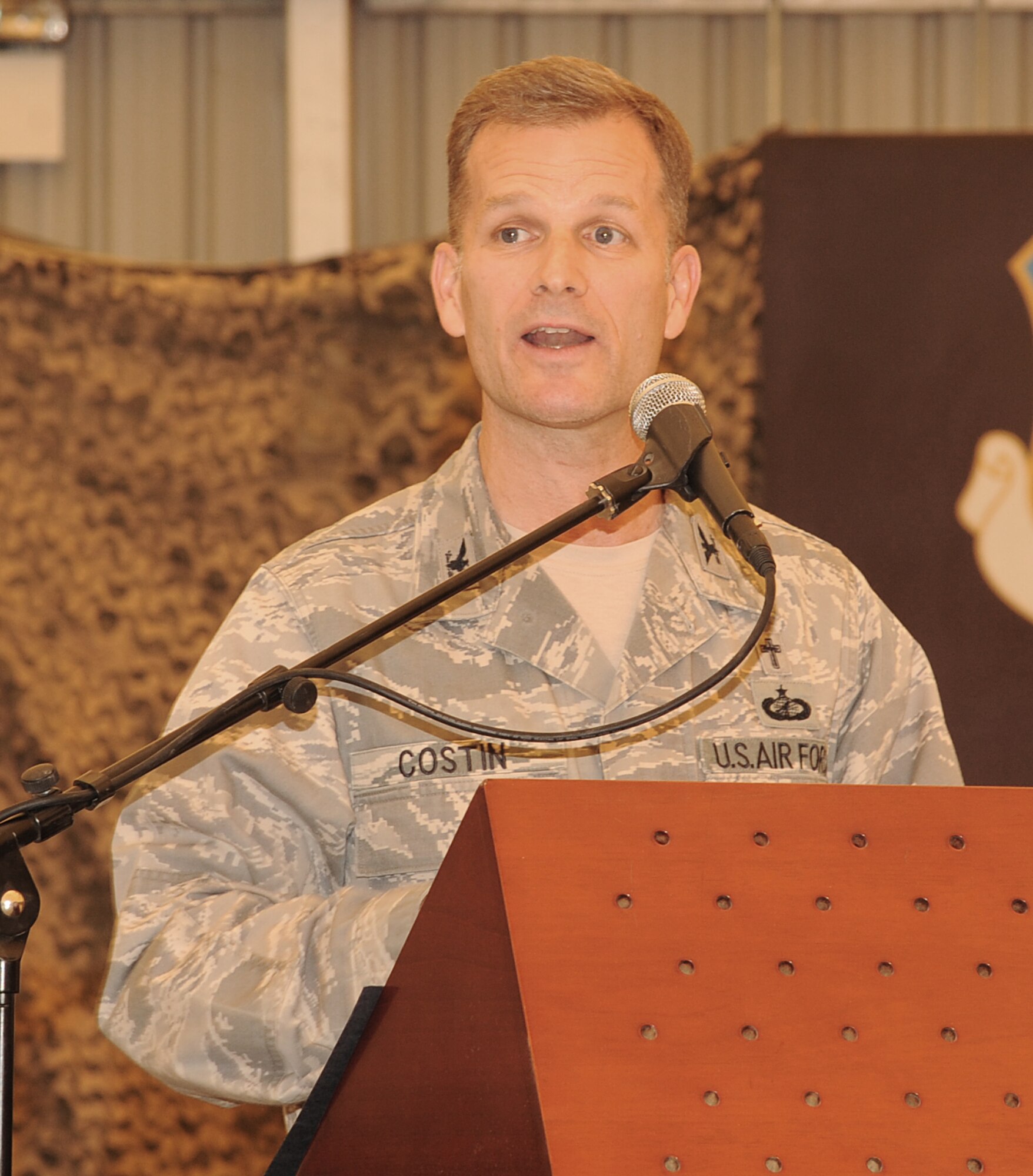 SOUTHWEST ASIA - Chaplain (Col.) Dondi E. Costin speaks about service and resilience to members of the 380th Air Expeditionary Wing during the 2012 National Prayer Luncheon at the Phantom Center March 20, 2012. As the Air Forces Central command chaplain, Costin provides functional oversight and pastoral care to Chaplain Corps personnel at 24 locations supporting 28,500 Airmen in Central and Southwest Asia. (U.S. Air Force photo/Tech. Sgt. Arian Nead)  

