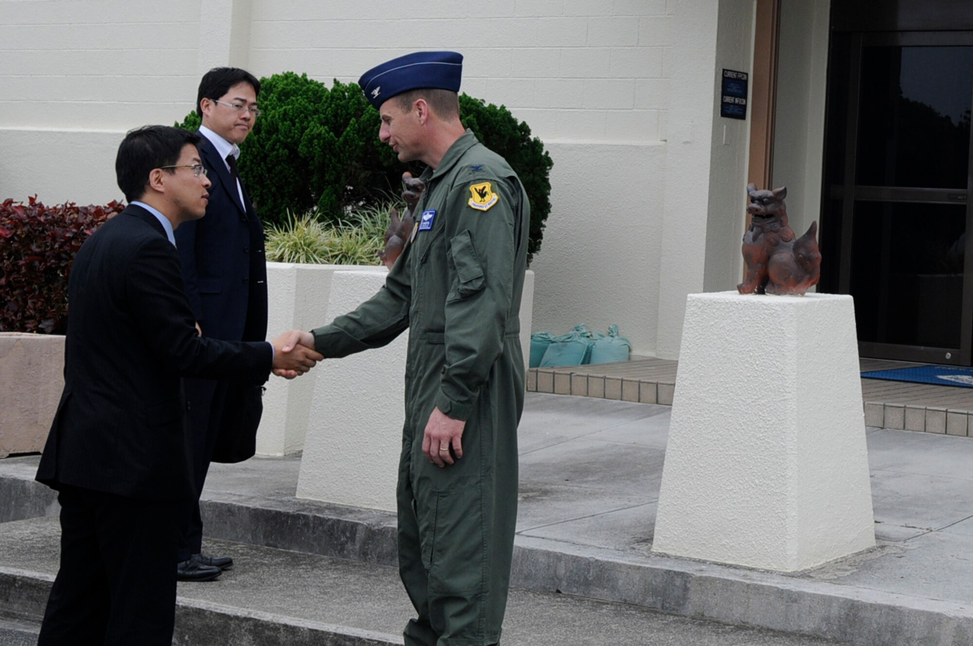 Newly appointed Deputy Chief of the Ministry of Foreign Affairs, OkinawaLiaison Office, Mr. Kenichi Matsuda meets with Col. Corey Martin, 18th Wingvice commander during an orientation visit at Kadena Air Base, Japan, on March 20, 2012. Mr. Matsuda received a wing mission briefing highlighting Kadena's strategicimportance in maintaining regional stability, how the wing exercises andimproves interoperability with Japan Self Defense Forces, and efforts toimprove understanding among members of the local community. (U.S. Air Force photo by Airman 1st Class Tara A. Williamson/Released)