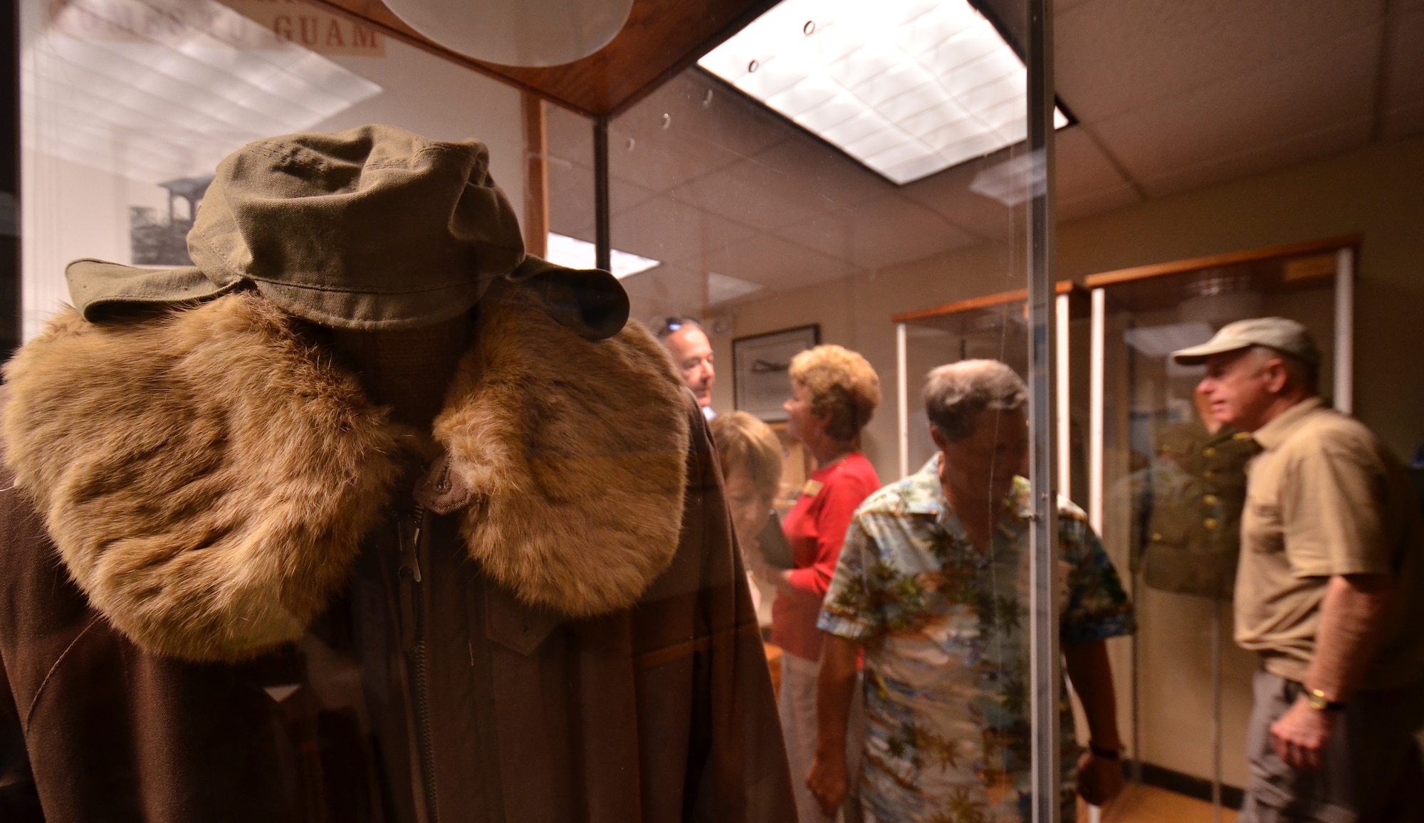 Member of a military historic tour group and interested personnel view Andersen's historical assets during a tour on Andersen Air Force Base March 13. The tour
was part of the 17th annual Military Histories tour that brings veterans back to the old battlefields on Guam and Iwo Jima. U.S. Air Force photo by Staff Sgt. Alexandre Montes/Released