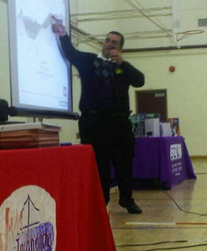 Civil Engineer Chadi Wahby of the U.S. Army Corps of Engineers Los Angeles District speaks to eight grade students at Belvedere Middle School Feb. 9 about what sparked his interest in engineering and about the type of work that still motivates him today.
