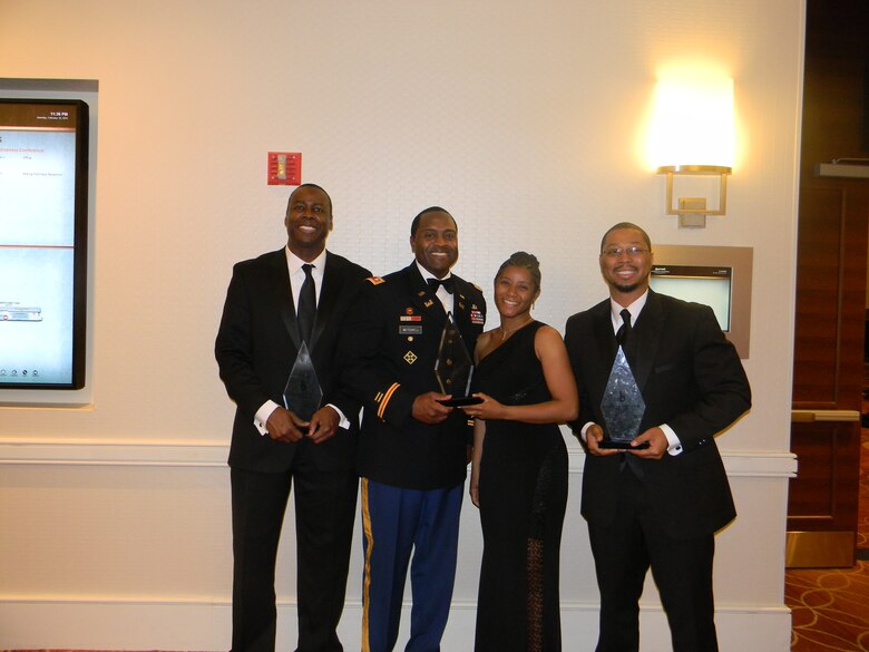 PHILADELPHIA — Four people with the U.S. Army Corps of Engineers were honored with Black Engineer of the Year Awards during the 2012 Black Engineer of the Year Science, Technology, Engineering and Math Conference here, Feb. 16-18, 2012. Henry Dulaney of Vicksburg District, Lt. Col. Anthony Mitchell and Tamika McDowell, both with Middle East District, and Cedric Bazemore of Japan District (left to right).           