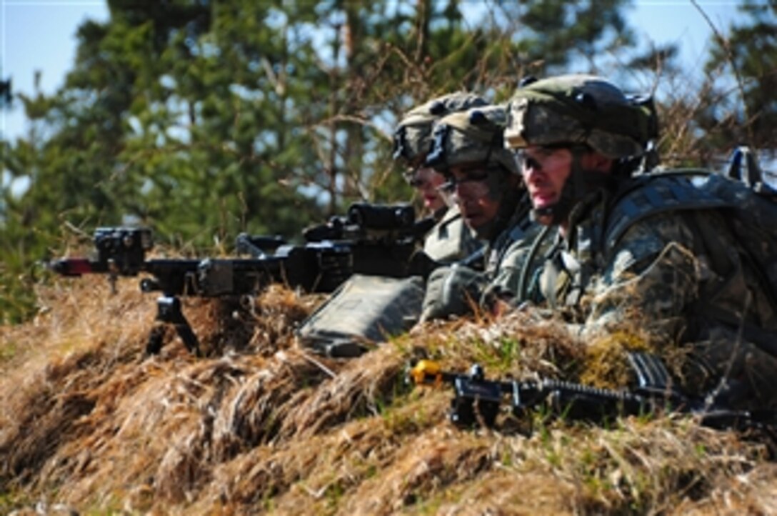 U.S. Army soldiers with the 2nd Battalion, 503rd Infantry Regiment, 173rd Airborne Brigade Combat Team provide security during a training exercise at the Joint Multinational Readiness Center in Hohenfels, Germany, on March 16, 2012.  The Army's 173rd Airborne Brigade, Europe's rapid-reaction force, conducted a mission rehearsal exercise at the readiness center in preparation for an upcoming deployment to Afghanistan.  The exercise was designed to develop combat skills, counterinsurgency tactics and multinational partnerships between the military forces of the U.S., Albania, Bosnia, Bulgaria, the Czech Republic, Romania, Serbia and Slovenia.  