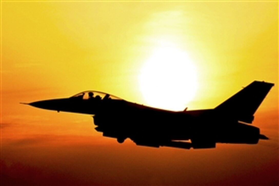 An F-16 Fighting Falcon launches at dawn during a Peninsula Operational Readiness Exercise on Kunsan Air Base, South Korea, March 20, 2012. The exercise ensures service members are capable of performing their duties in wartime conditions.