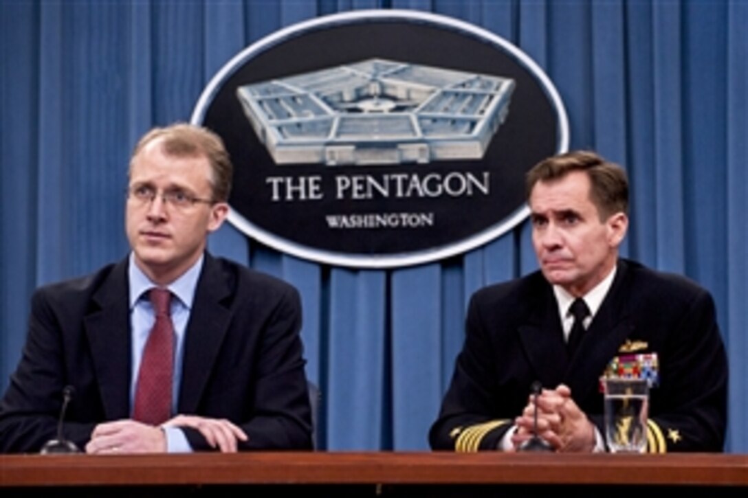 Pentagon Press Secretary George Little and Navy Capt. John Kirby, Pentagon spokesman, brief the press corps on defense-related issues at the Pentagon, March 21, 2012.