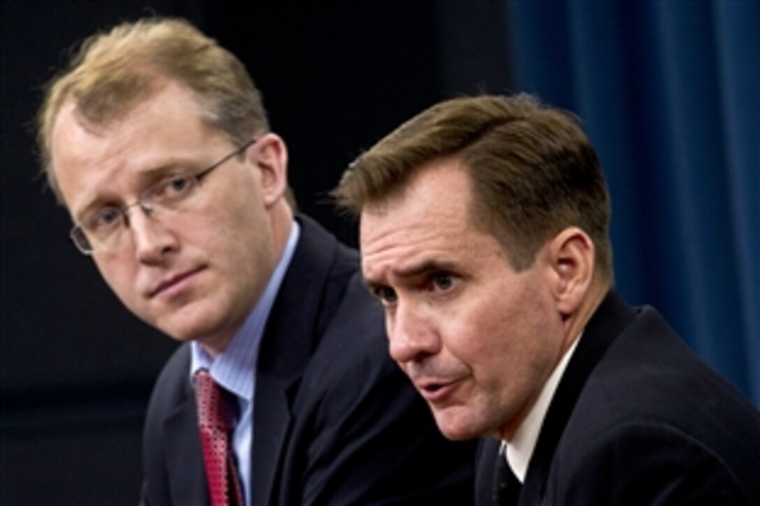 Pentagon Press Secretary George Little and Navy Capt. John Kirby, Pentagon spokesman, brief the press corps on defense-related issues at the Pentagon, March 21, 2012.