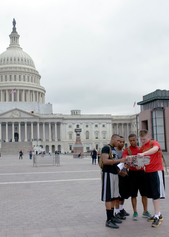 Marines with the Marine Corps Institute Company at Marine Barracks Washington stop to find their bearings while participating in the Urban Challenge, the third event in the 2012 Commander’s Cup, March 21. During the Urban Challenge Marines were given clues that led to seven destinations throughout the District, it was then up to the Marines to get to those locations as quickly as possible, “by any means necessary.”  (Official Marine Corps Photo by Cpl. Jeremy Ware/Released)