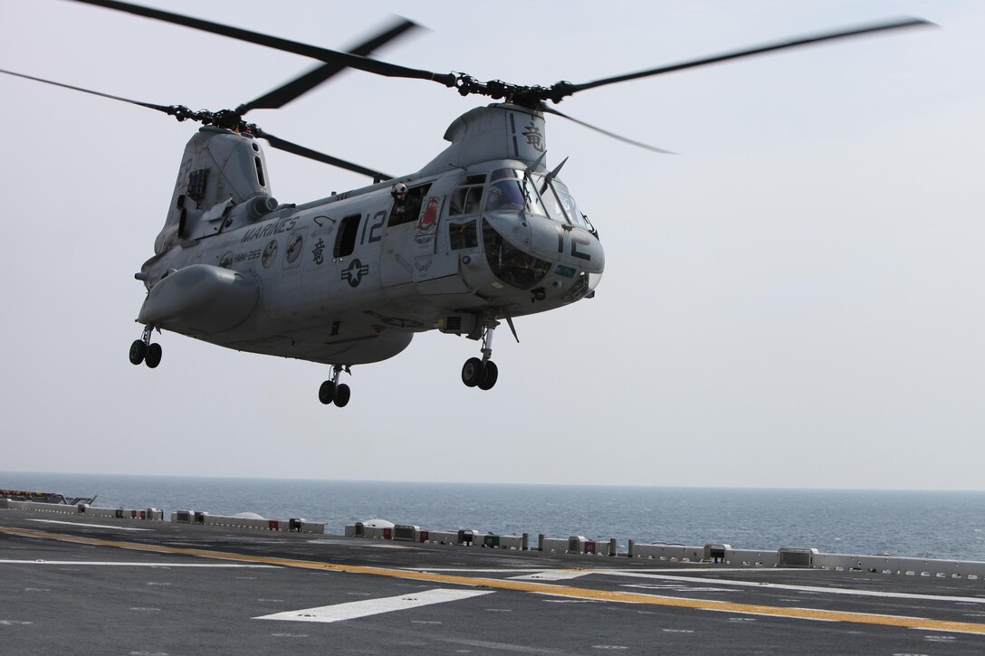 A CH-46E Sea Knight helicopter with Marine Medium Helicopter Squadron 265 (Reinforced), 31st Marine Expeditionary Unit, lifts from the deck of the USS Essex on a flight that surpassed the 12,000 flight hour milestone, March 22. The 31st MEU serves as the United States’ force in readiness for the Asia-Pacific region.
