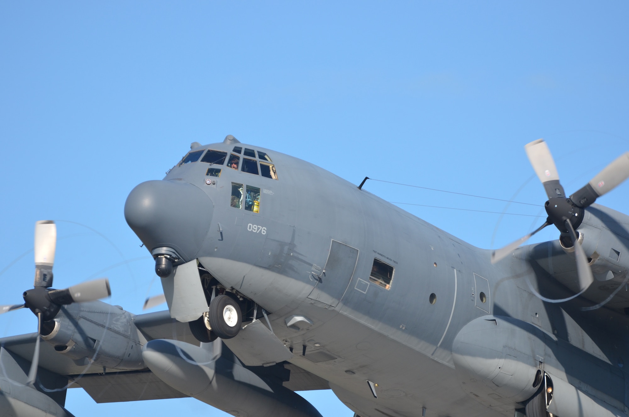 U.S. Airmen from the 39th Rescue Squadron, Patrick Air Force Base, Fla., pilot an HC-130P/N King aircraft in search and rescue competition over Marathon Key, Fla., against Royal Canadian Airmen from the 435 Squadron, Manitoba, Canada. Both squadrons perform search and rescue and compete several times annually to enhance their rescue capabilities. (U.S. Air Force photo/Capt. Cathleen Snow)