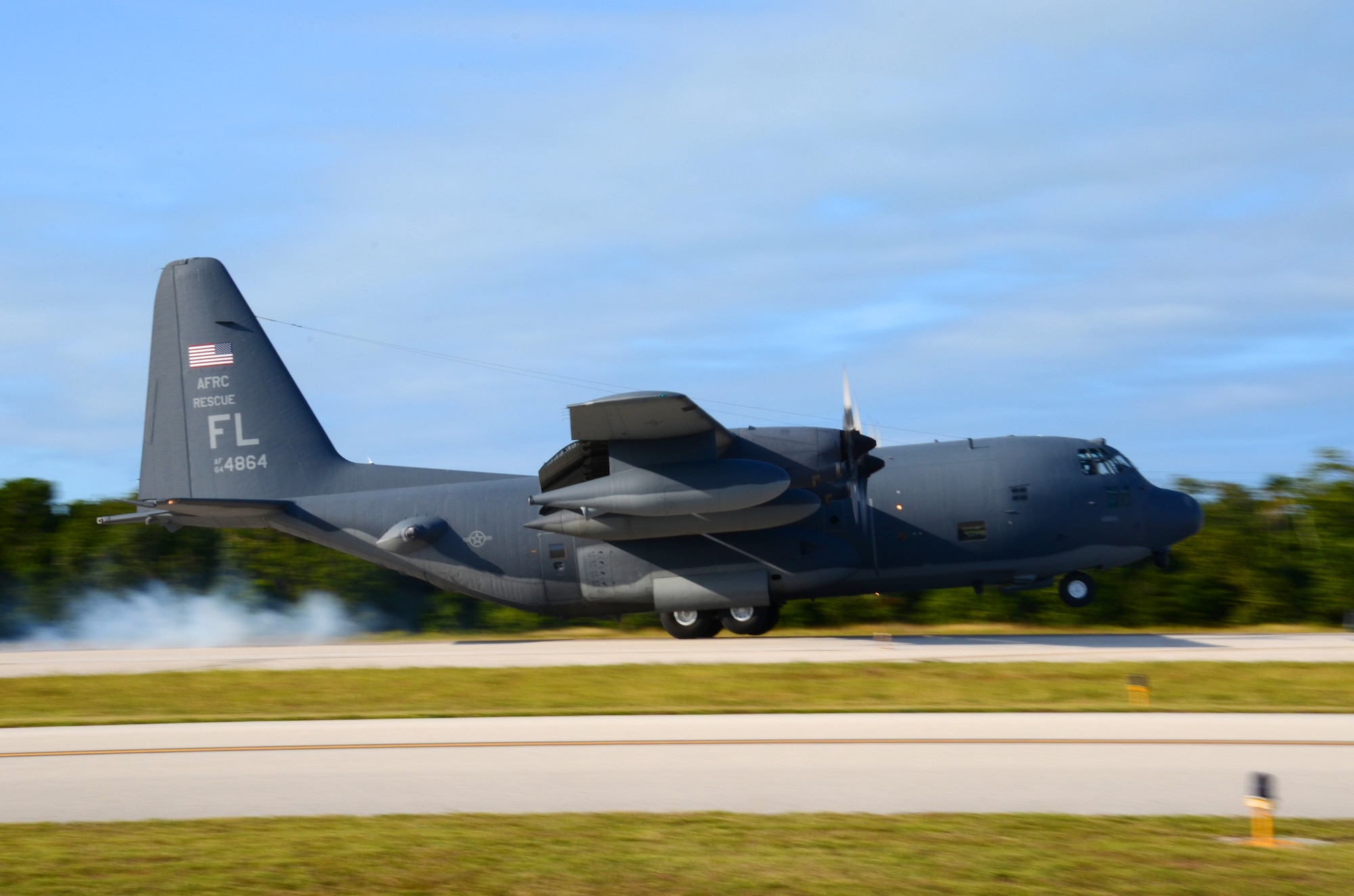 U.S. Airmen from the 39th Rescue Squadron, Patrick Air Force Base, Fla., pilot an HC-130P/N King aircraft in search and rescue competition at Marathon Key, Fla., against Royal Canadian Airmen from the 435 Squadron, Manitoba, Canada. The competition encompasses various scenarios to include a spot landing competition to test their precision landing skills. (U.S. Air Force photo/Senior Airman Natasha Dowridge)