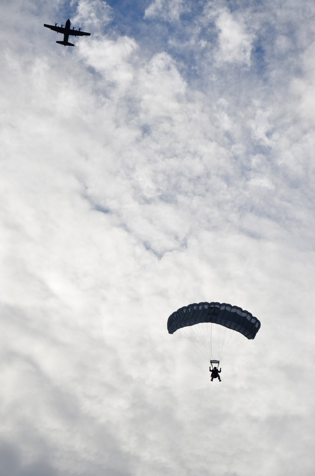 Search and rescue Aircrew Airmen from the 920th Rescue Wing, Patrick Air Force Base, Fla., pilot an HC-130P/N King aircraft to serve as a jump platform for pararescue Airmen during jump camp traiing. The U.S. Airmen participated in an international SAR exercise with Canadian SAR forces from Winnipeg's 17 Wing in Key West, Fla. this winter. (U.S. Air Force photo/Senior Airman Natasha Dowridge)