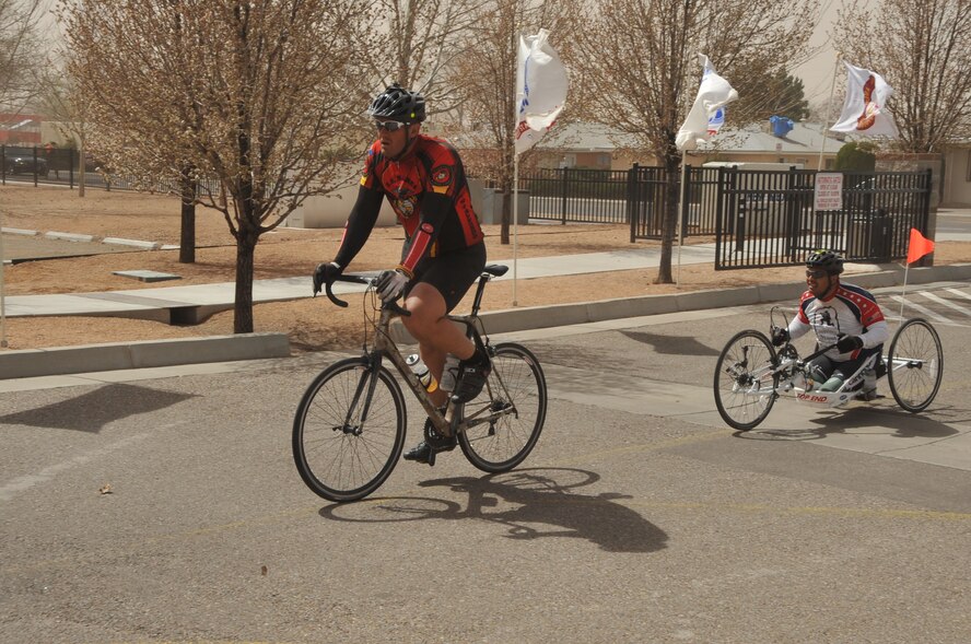 Jeremy Staat, a former NFL player and Marine, and Wesley Leon-Barrientos, a three time Purple Heart recipient, former member of the Army’s 101st Airborne Division and double amputee, arrived at the New Mexico Veterans Memorial for a welcome ceremony March 18 on their cycling trip from the Wall of Valor, in Bakersfield, Calf., to the Vietnam Memorial Wall, in Washington, D.C., to raise awareness of veterans issues.