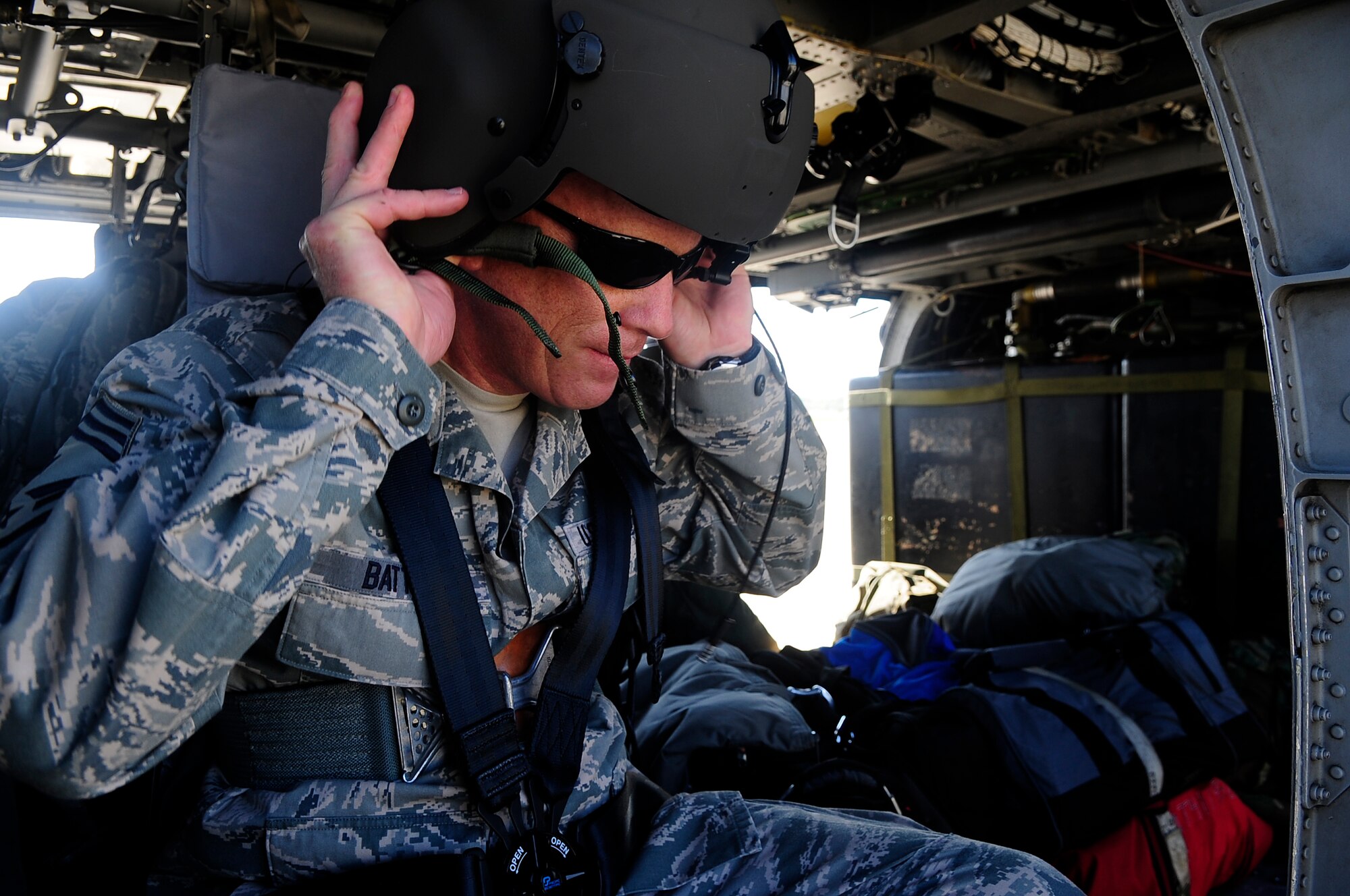U.S. Air Force Command Chief Master Sgt. Frank Batten, 23rd Wing Command Chief, prepares for takeoff on an HH-60 Pave Hawk at Shaw Air Force Base, S.C., March 22, 2012. Batten was returning to Moody Air Force Base after attending the 2011 Outstanding Professionals of the Year ceremony. (U.S. Air Force photo by Airman 1st Class Hunter Brady/Released)