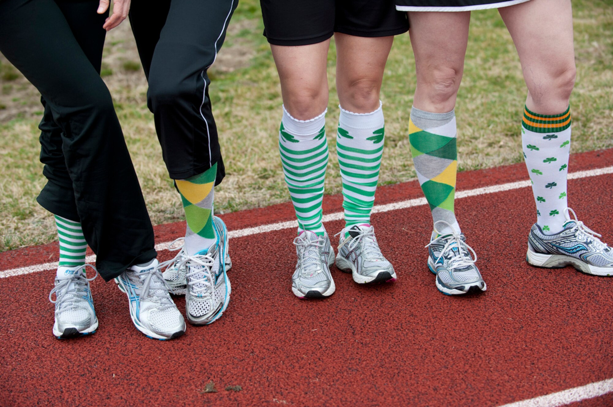 Runners prepare for the kick-off of the St. Patty's Day Pot O' Gold 5K run March 16 here. The joint base community sported their best Irish looks for the run. (U.S. Air Force photo by Russ Meseroll/Released)
